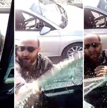 Trafikte maganda terörü: Otobüsün camını yumruk atarak patlattı