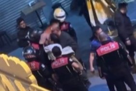 Kavgayı ayıran polise kafa attı